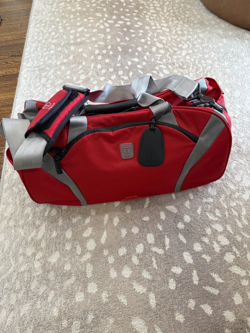 Tumi Red and Gray Men's Duffel Bag with Shoulder Strap